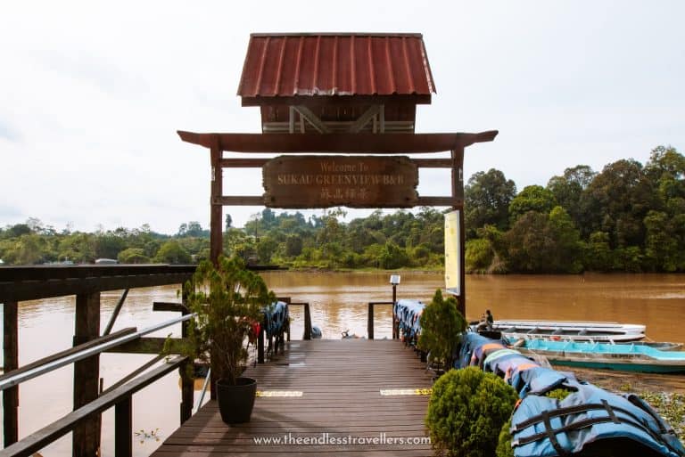 Sukau Greenview B&B jetty entrance with welcome sign on the Kinabatangan River, Sabah Borneo